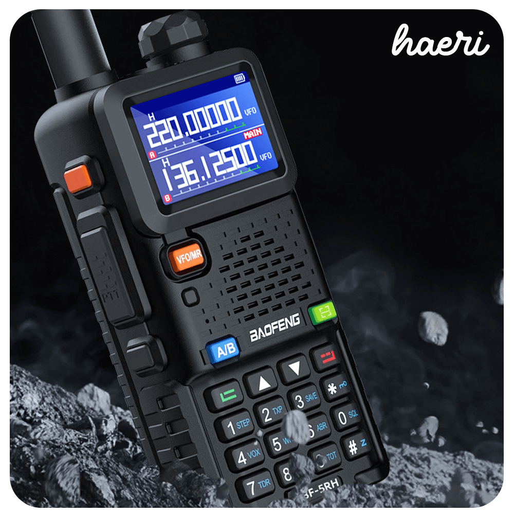 Baofeng UV-5RH 10W two-way radio with clear LCD screen and keypad against a dark rocky background.