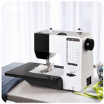 Electric sewing machine UKICRA UFR-738A on table, ideal for home workshops, featuring reliable, easy operation in white and black finish.