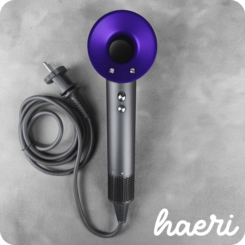 Innovative hair dryer with ionization, 3 speed settings, and 4 temperature controls, resembling popular Dyson Supersonic design.